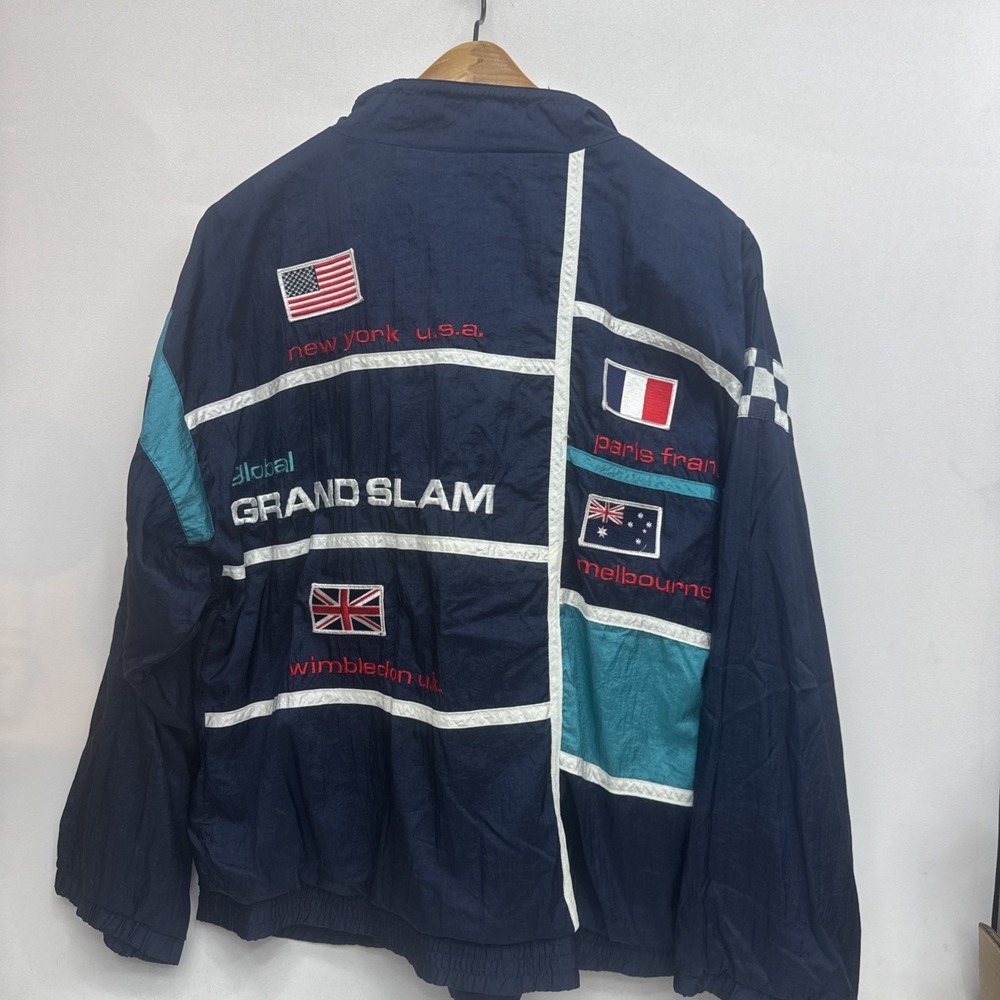 Vintage 90's IXSPA By Jamie Sadock Global Grand Slam windbreaker Men's XL